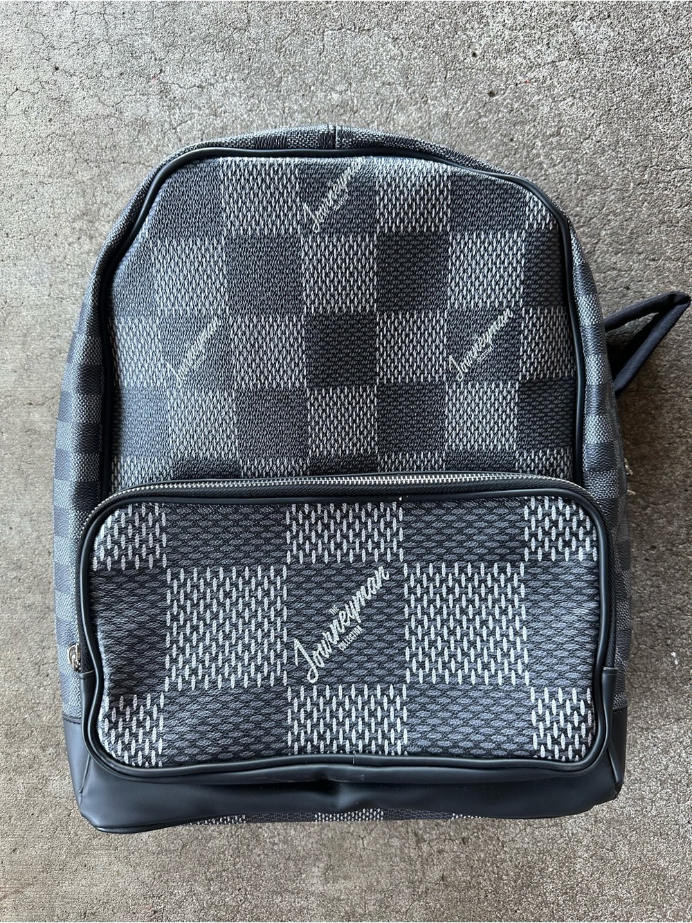 Journeyman Black Logo Checkered Print Leatherette Backpack